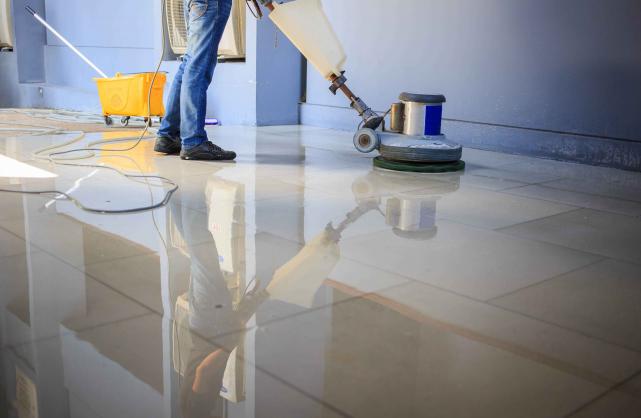 Janitor cleaning the floor