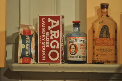 Old cleaning products on a shelf