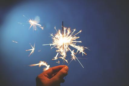 Hand holding sparkler